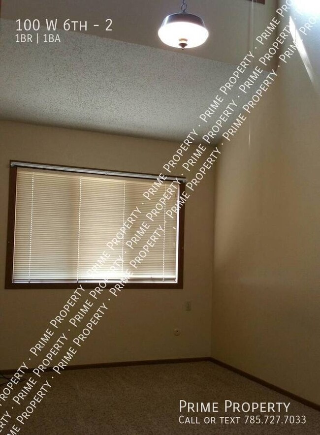 Building Photo - 100 W 6th-2