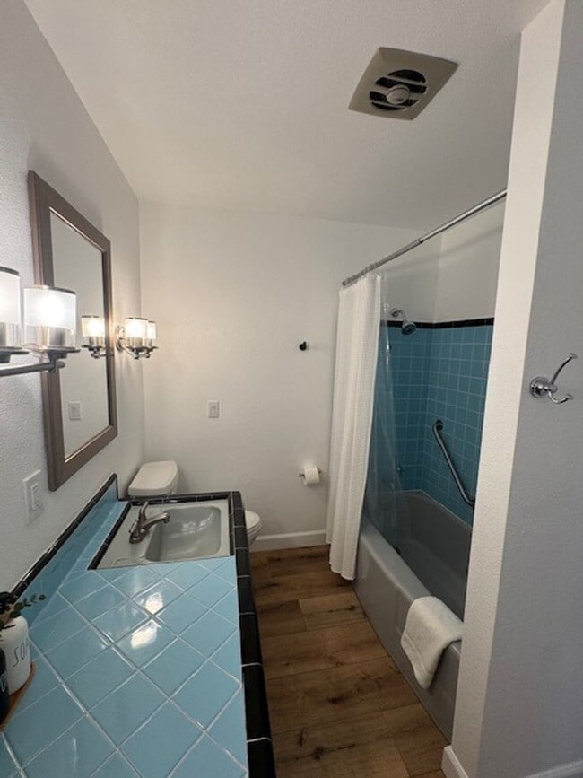 Building Photo - Beautifully Furnished and Recently Painted, Corner Lot Home Features a Fenced Backyard with an In...