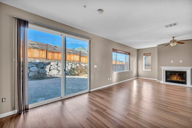 Building Photo - Sun-Filled, Spacious Living with a Three-Car Garage