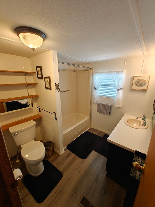 Building Photo - 1002 51st Avenue Plaza W