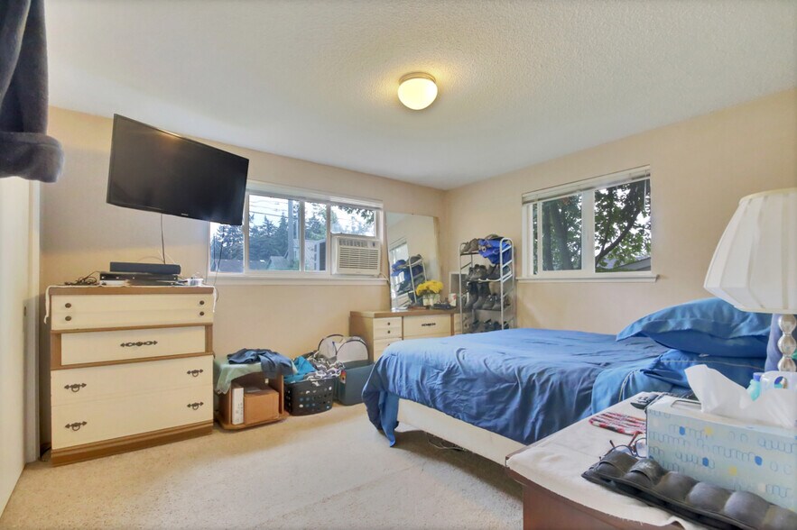 Main bedroom, excuse the clutter - 7017 Sacramento St SW