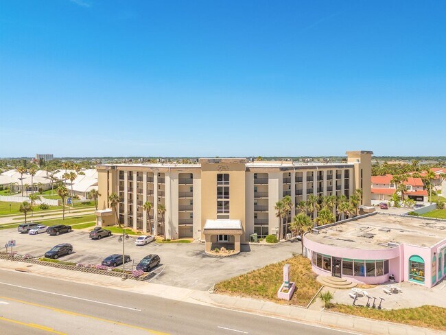 Building Photo - Wake Up to the Ocean Breeze – Your Beachsi...
