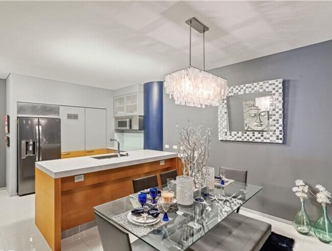 Building Photo - BEAUTIFULLY FURNISHED, MOVE-IN READY HIGH-RISE CONDO WITH STUNNING VIEWS!