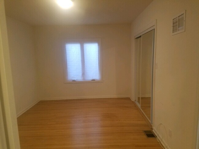 Bedroom with window. - 956 Euclid St