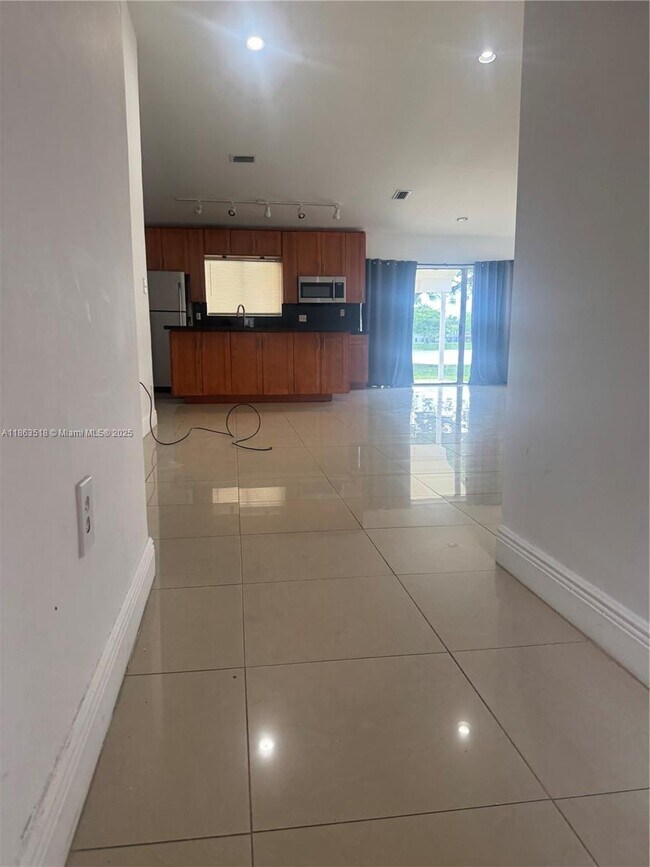 Building Photo - 14570 SW 145th Pl