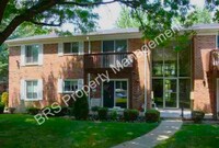 Building Photo - Charming 2-Bedroom Condo in Clinton Twp. –...