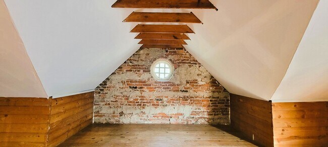 Building Photo - Remodeled brick bungalow with 1st floor li...