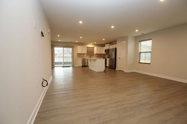 Building Photo - Maintenance Free Living in this Brand New ...