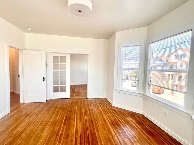 Building Photo - Fully Renovated Bright Corner Apartment wi...