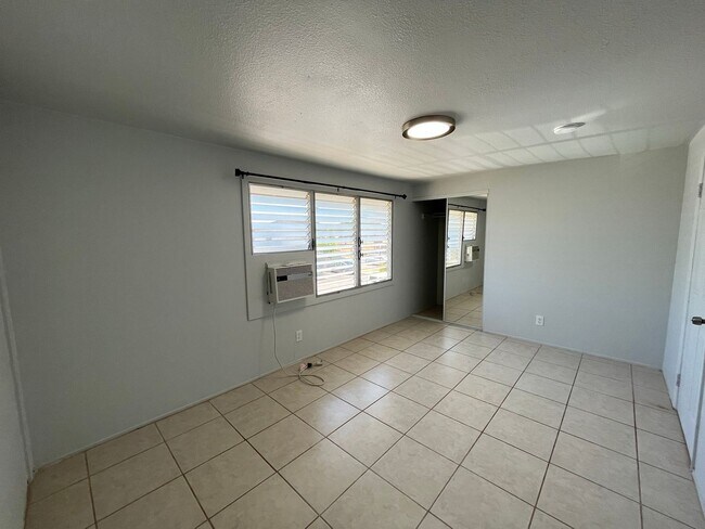 Building Photo - SECTION 8 OK! 2 level townhouse 3 Bedroom, 1 Bathroom Unit With 1 Parking Stall Available Now!