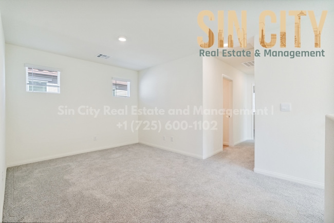 Building Photo - "Charming 4-Bed Oasis on La Cura Avenue: Spacious Living with 2.5 Baths in Vibrant Las Vegas!"