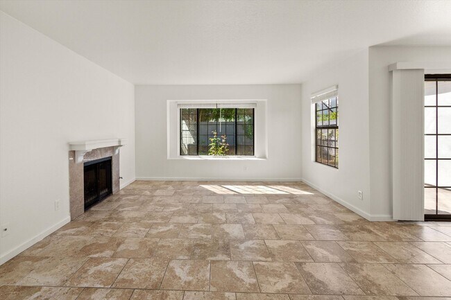 Building Photo - Large Renovated 3bed x 2.5bath Townhouse with Private Patio & 2-Car Garage