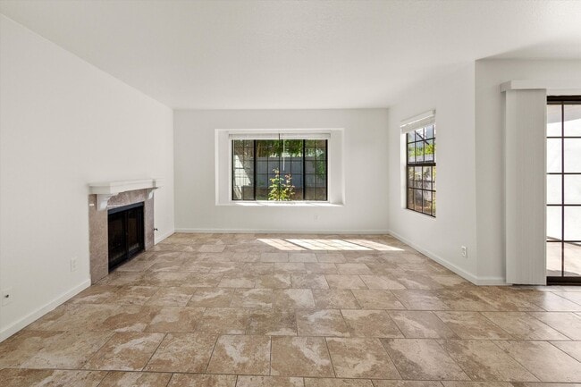 Building Photo - Renovated 2bed x 2.5bath Townhouse with Private Patio & 2-Car Garage