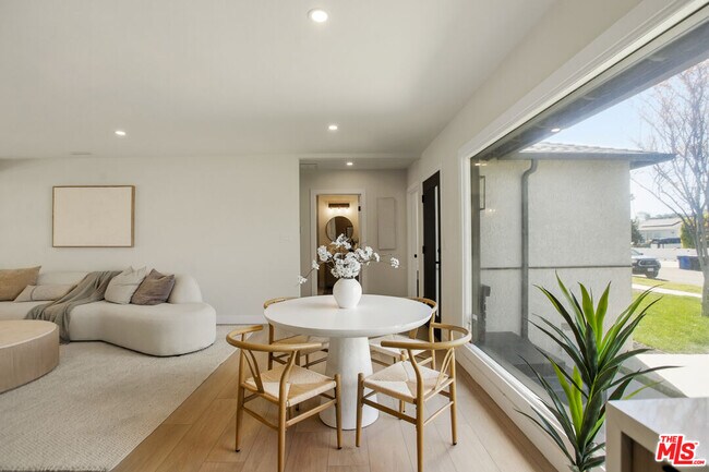 Building Photo - 7358 Paso Robles Ave