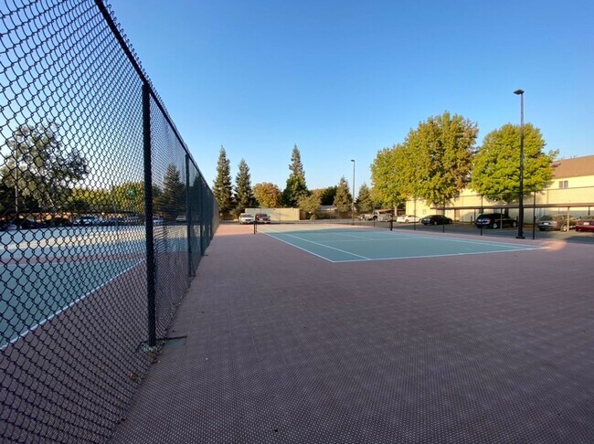 Building Photo - Upgraded 2 bedroom condo in a gated commun...
