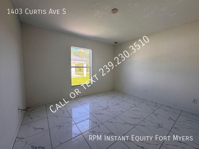 Building Photo - 1403 Curtis Ave S