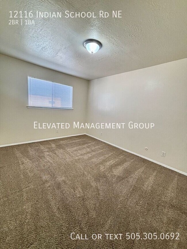 Building Photo - 12116 Indian School Rd NE