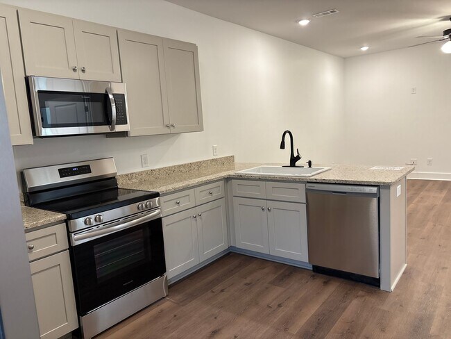Building Photo - Beautiful New Construction Townhome in She...