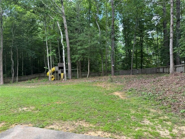 Building Photo - 7454 Woody Springs Dr