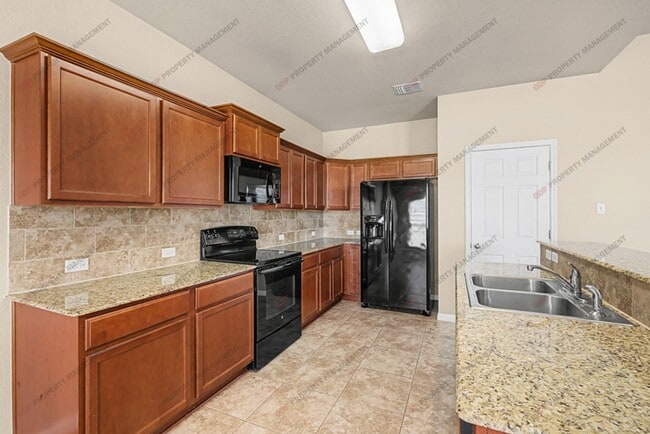 Building Photo - 8108 Honeysuckle