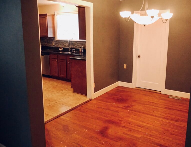 Deep Navy Blue Dining Rm to Kitchen - 2270 Larchmont Rd