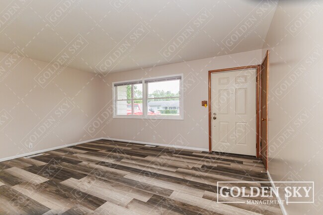 Building Photo - 3129 S Opechee Dr