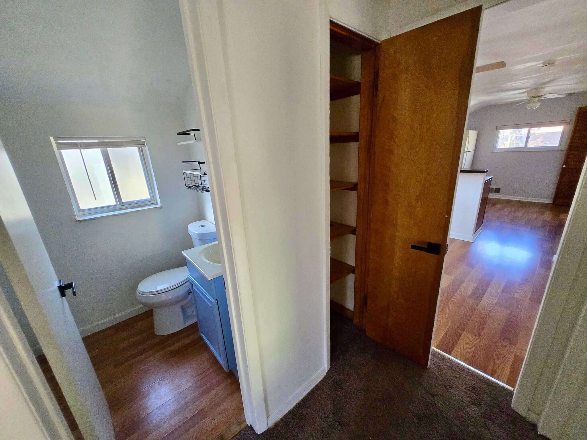 Hallway from livingroom to bathroom, to kitchen/dining - 2612 Louisiana Ave