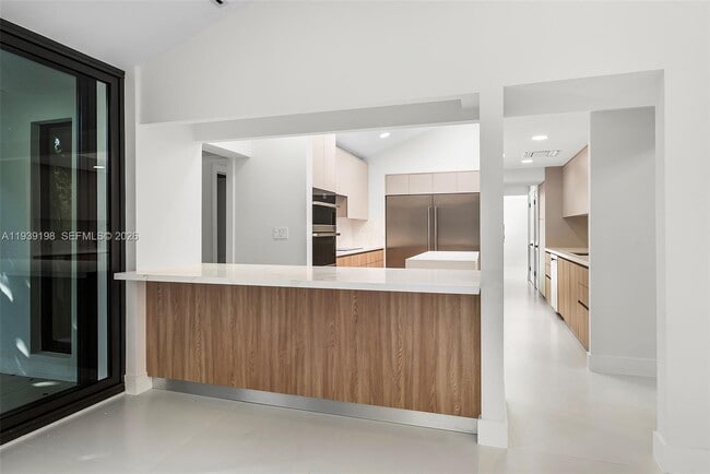 Building Photo - 7540 Los Pinos Blvd