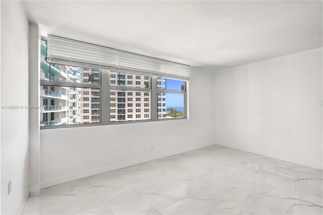 Building Photo - 5055 Collins Ave