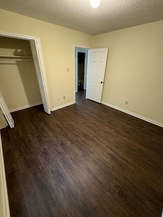 Building Photo - Two-Bedroom, 1.5 Bathroom Corner Condo at ...