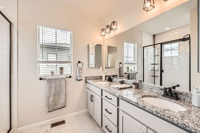 Building Photo - Evolve Real Estate: Available Immediately! Almost NEW Large 3 Bedroom in STERLING RANCH!