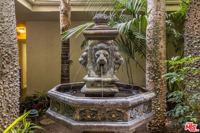 Building Photo - 1230 N Sweetzer Ave