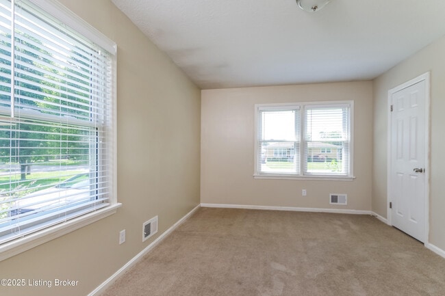 Building Photo - 8003 Canna Dr