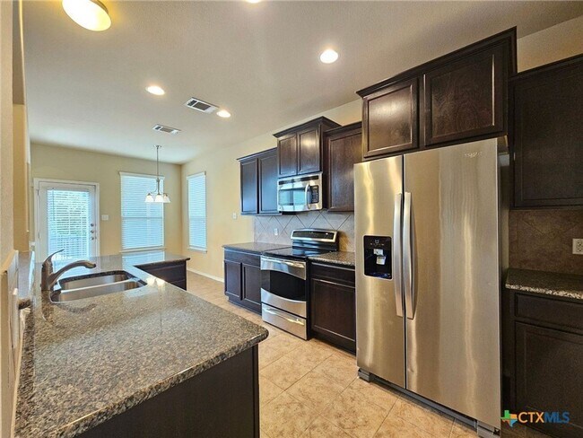 Building Photo - 7112 Cokui Dr