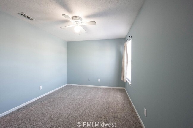 Building Photo - "Spacious 4-Bedroom Gem with Finished Base...