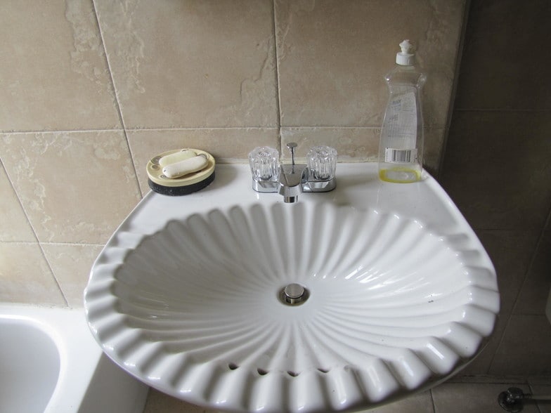 Scalloped porcelain sink - 49 N 20th St