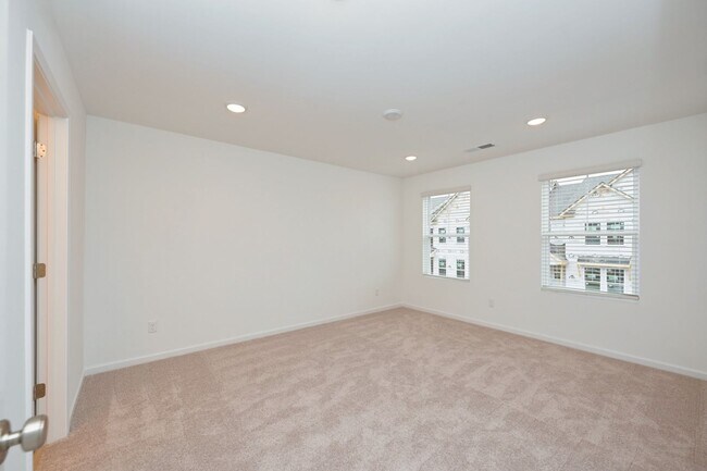 Building Photo - **BE THE LUCKY ONE TO LIVE IN THIS 2024-BUILT BRICK TOWNHOME IN THE VILLAS AT REGAL SQUARE FEATUR...