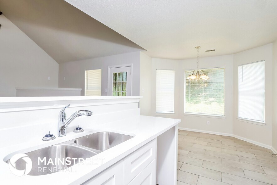 Building Photo - 6096 Hallum Dr