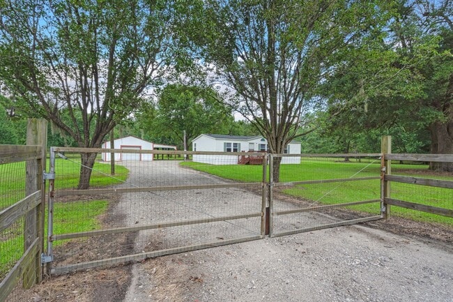 Building Photo - beautifully refreshed 3-bedroom, 2-bath home offering peaceful country living with modern updates!