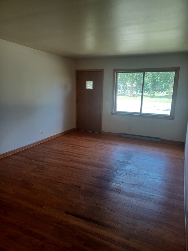 Building Photo - 211 W. Decorah Rd.