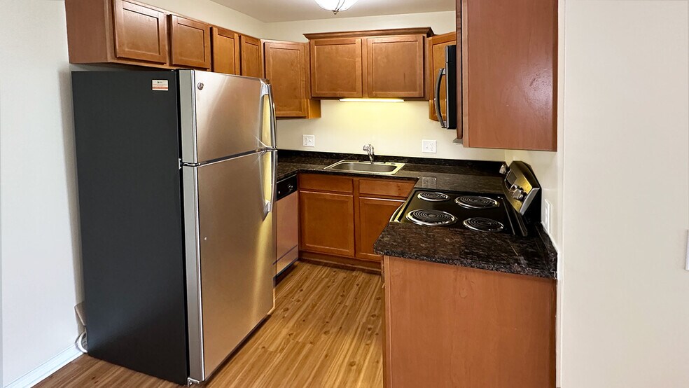 A friendly focal point for your home is this updated, upgraded kitchen with modern features, yet traditional charm. Your meals just taste better from a Briarwood kitchen. - Briarwood Park Apartments