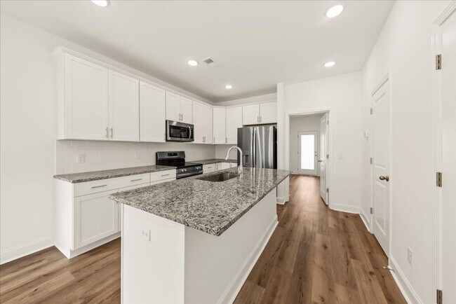 Building Photo - BRAND NEW TOWNHOUSE!!