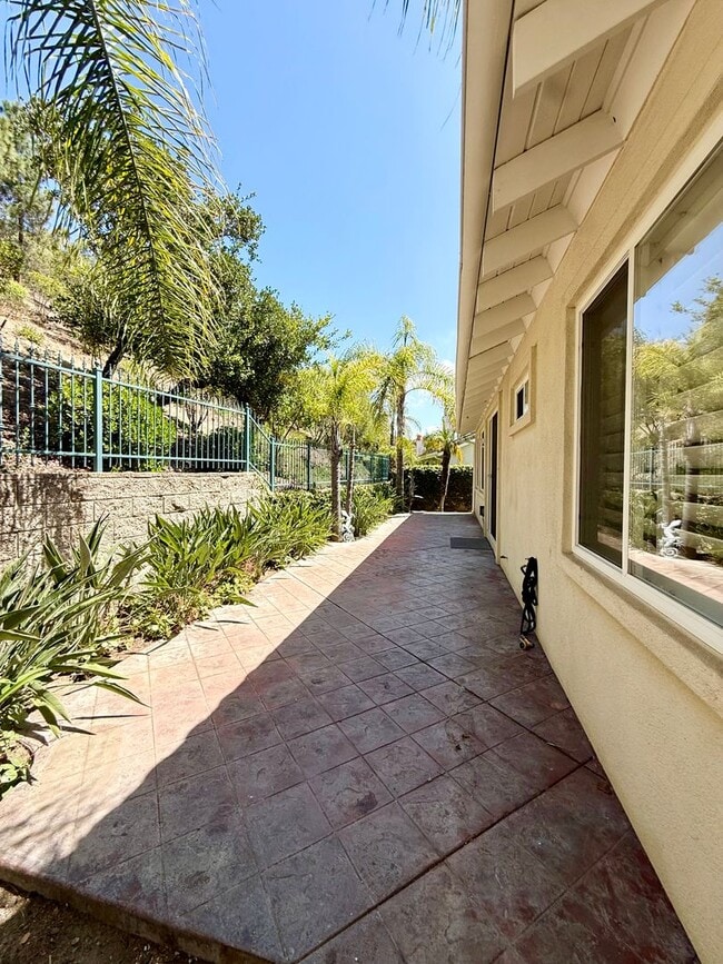 Building Photo - Gated 4 Bedroom 3 1/2 Bath Two Story Home