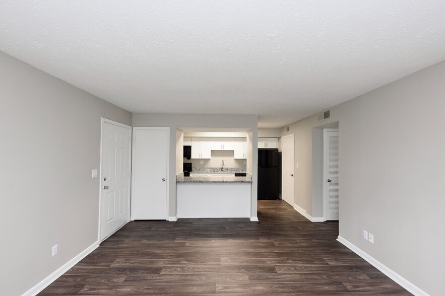 Spacious living room with hardwood-style flooring - Harpeth Trace