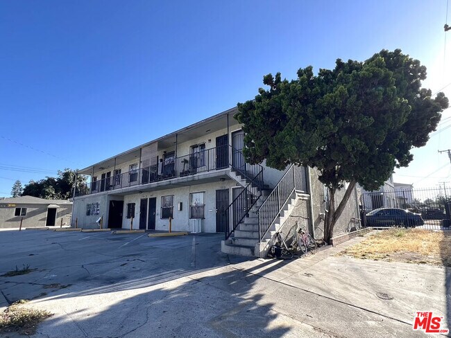 Building Photo - 1016 W 109th Pl