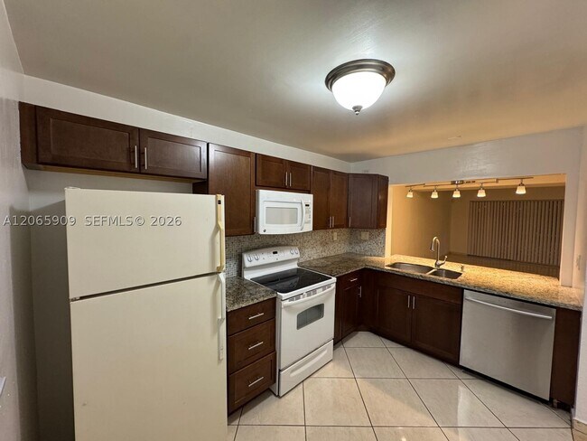 Building Photo - 3022 Coral Springs Dr