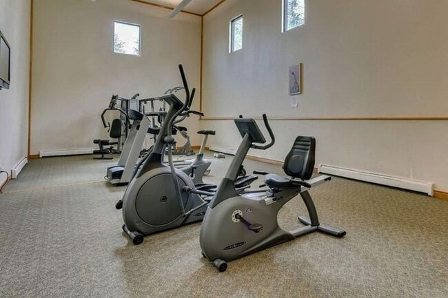 Building Photo - A 6 month lease at a 12 month rate includes most utilities!!  2 Bedroom Treehouse condo!  Best sk...