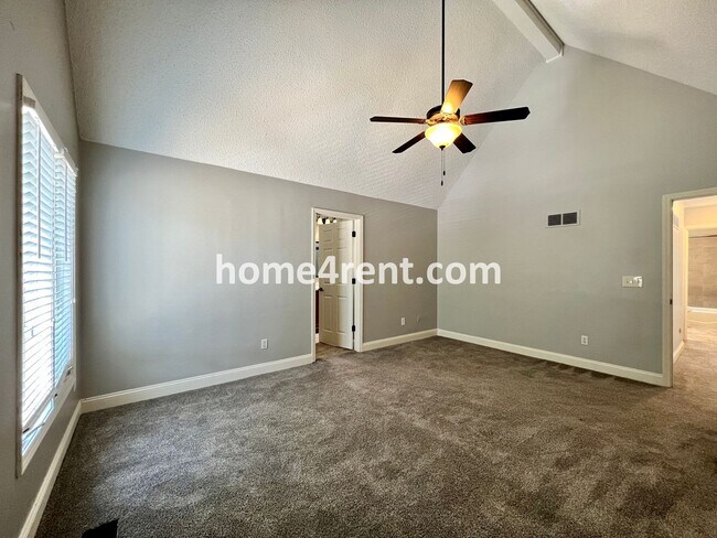 Building Photo - Maintenance Free Living w/ Hardwood Floors, Open Layout, Granite Counters, Finished Basement!