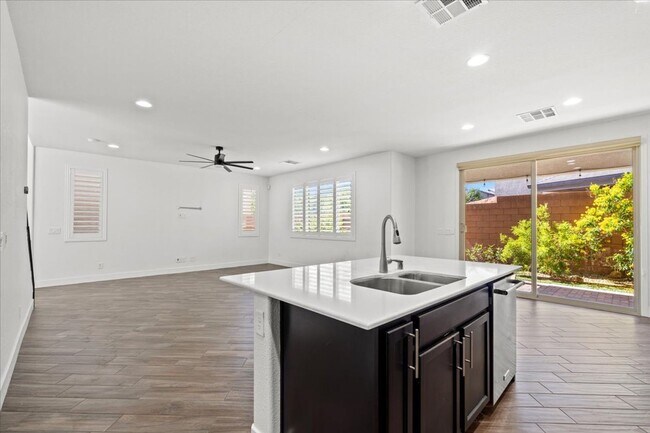 Building Photo - Modern Gated 3 Bedroom Retreat with Loft & Entertainer’s Backyard