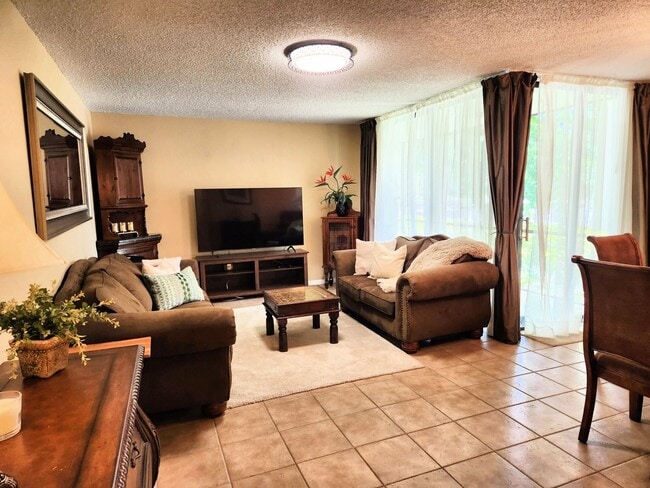 Living Room with Pull Out - 825 Egret Cir
